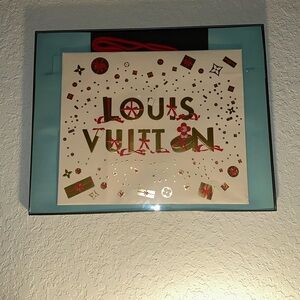 Louis Vuitton Festive Gift Bag with Red and Gold Accents